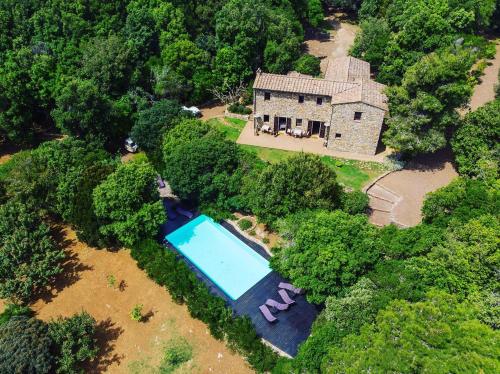 an aerial view of a house with a swimming pool at Villa Experience - Relais Il Termine Elba in Rio Marina