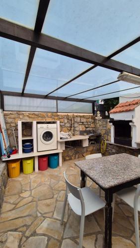 Η κουζίνα ή μικρή κουζίνα στο PICCOLA CASA CON GIARDINO