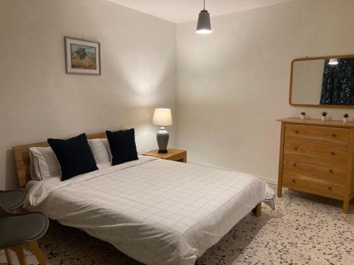 Ένα ή περισσότερα κρεβάτια σε δωμάτιο στο Casa Borassi