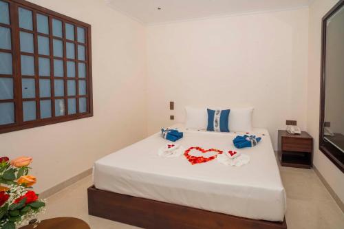 Ένα ή περισσότερα κρεβάτια σε δωμάτιο στο Grand Phan Thiet Hotel