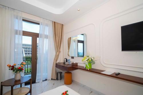 Μια τηλεόραση ή/και κέντρο ψυχαγωγίας στο Grand Phan Thiet Hotel