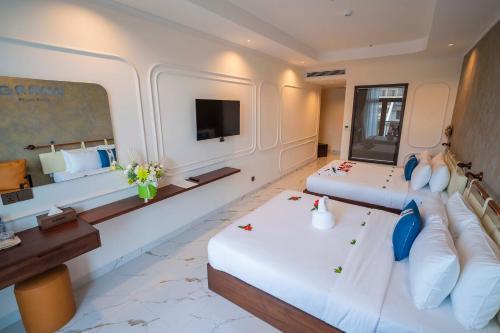 Μια τηλεόραση ή/και κέντρο ψυχαγωγίας στο Grand Phan Thiet Hotel