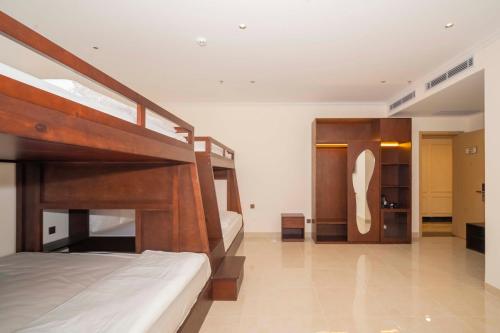 Ένα ή περισσότερα κρεβάτια σε δωμάτιο στο Grand Phan Thiet Hotel