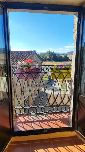 a view from a window of a balcony at Boomerang Cottage B&B in Quintanapalla