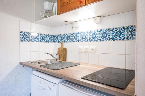 Η κουζίνα ή μικρή κουζίνα στο Appartement 'Bds1 37' 5 Couchage