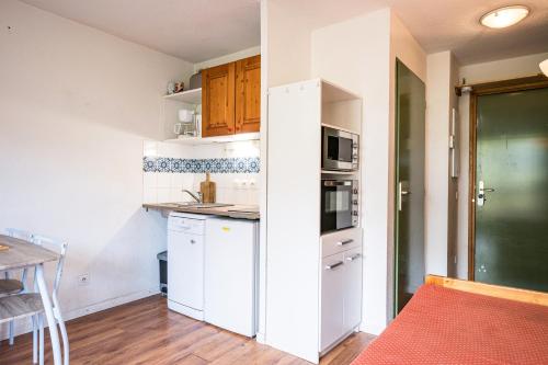 Η κουζίνα ή μικρή κουζίνα στο Appartement 'Bds1 37' 5 Couchage