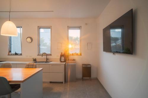 Køkken eller tekøkken på Olga Resort - אולגה ריזורט