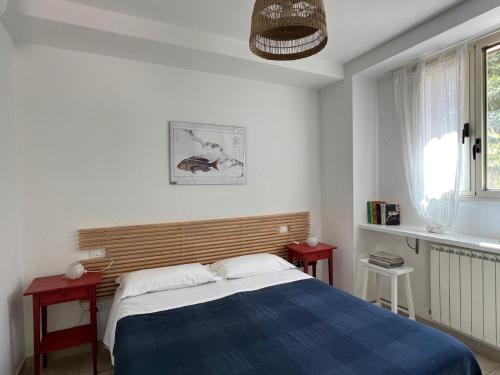 Ένα ή περισσότερα κρεβάτια σε δωμάτιο στο Da Elio Case Vacanza e Stanze