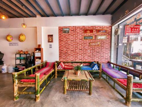 Ruang duduk di Hug Pai Garden City Retreat