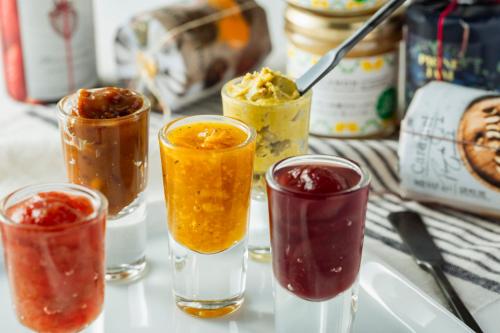 a group of four glasses filled with different types of food at HOTEL GRANVIA HIROSHIMA SOUTH GATE in Hiroshima