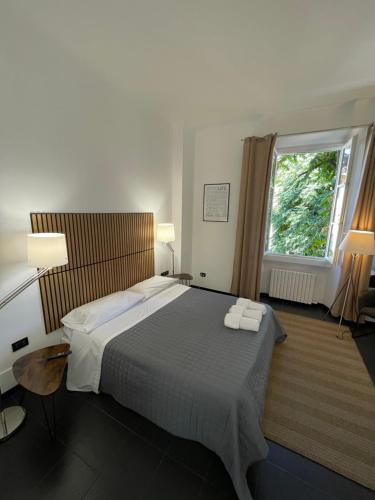 Giường trong phòng chung tại Antica corte Navigli-Darsena