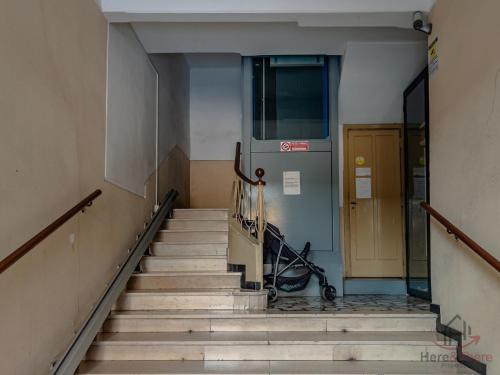 an empty hallway with stairs in a building at Spiagge 3 min - stazione 500m - WiFi - Smart TV in Albisola Superiore