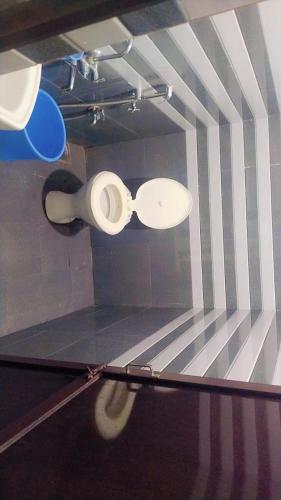 a glass window with a pair of sunglasses on it at HOTEL OM VADODARa in Vadodara