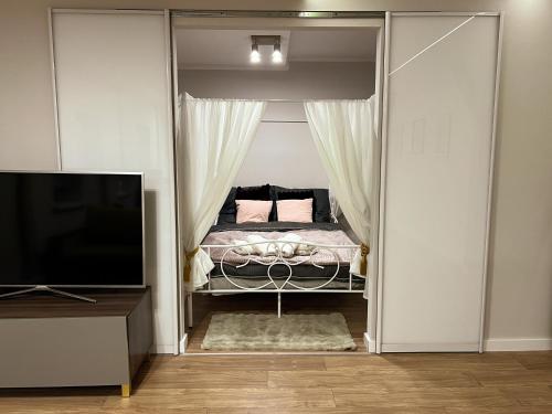 Postel nebo postele na pokoji v ubytování Bytom Cabernet