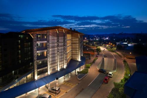a tall building with a street in front of it at AlbaResidence Masera26 in Alba