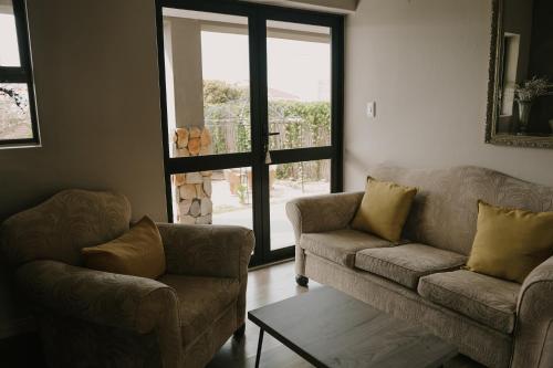 Χώρος καθιστικού στο Stone Olive Guesthouse
