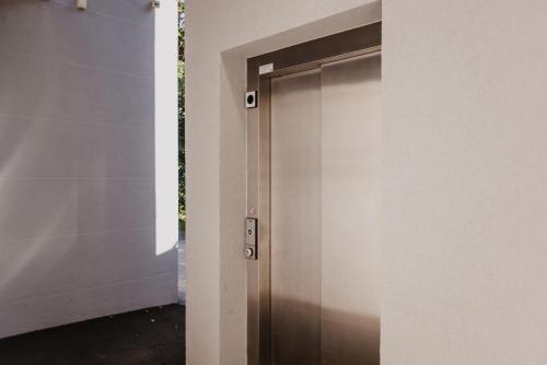 a door that is open to a building at Ewitsch 13 - Hotel Garni in Berghausen