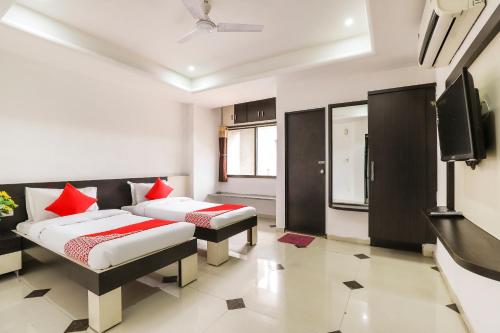Katil atau katil-katil dalam bilik di Hotel O Sun And Shine