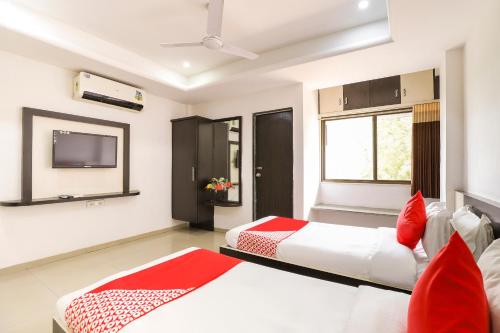 Katil atau katil-katil dalam bilik di Hotel O Sun And Shine