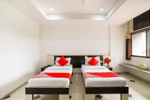 Katil atau katil-katil dalam bilik di Hotel O Sun And Shine