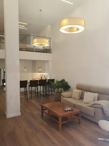 a living room with a couch and a table at Espacio 21 in Córdoba