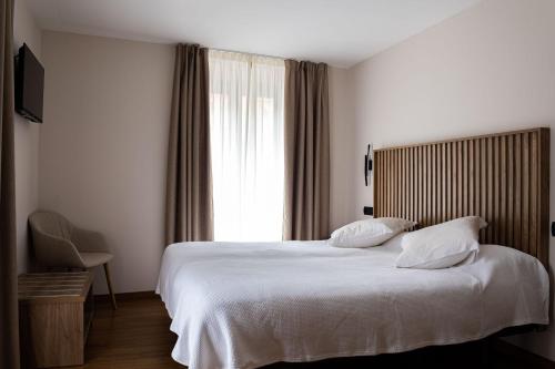 Postel nebo postele na pokoji v ubytování Viña Femita