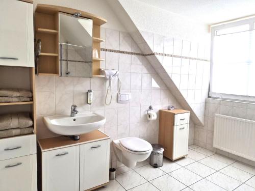 Ένα μπάνιο στο Das Nest Boardinghouse Hamburg Niendorf