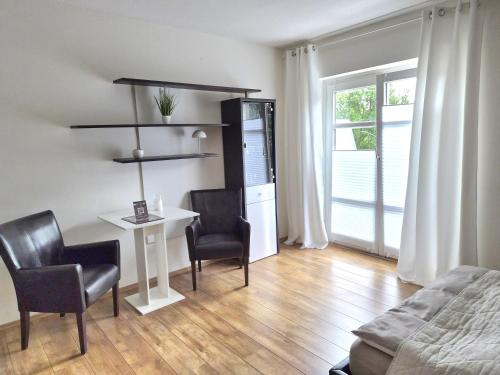 Χώρος καθιστικού στο Das Nest Boardinghouse Hamburg Niendorf