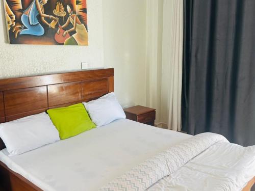 Llit o llits en una habitació de Barayata APARTMENT
