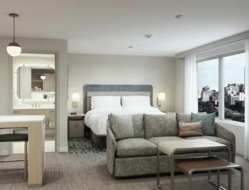 Postel nebo postele na pokoji v ubytování Homewood Suites By Hilton Wichita Airport