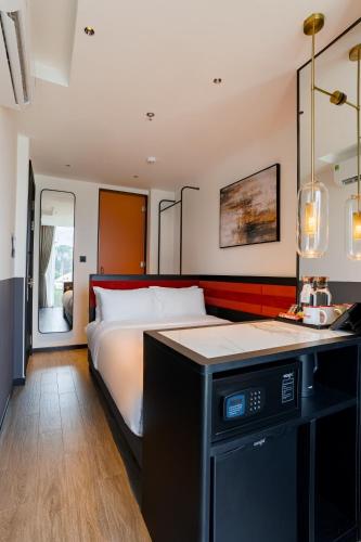 Una cocina o zona de cocina en The Signature Hotel Saigon