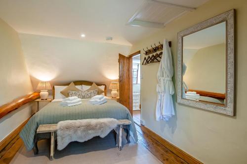 Voodi või voodid majutusasutuse Fox Cottage toas