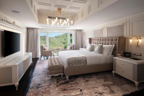 Una cama o camas en una habitación de Ayan Zalaat