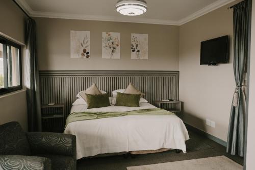 Ένα ή περισσότερα κρεβάτια σε δωμάτιο στο Stone Olive Guesthouse
