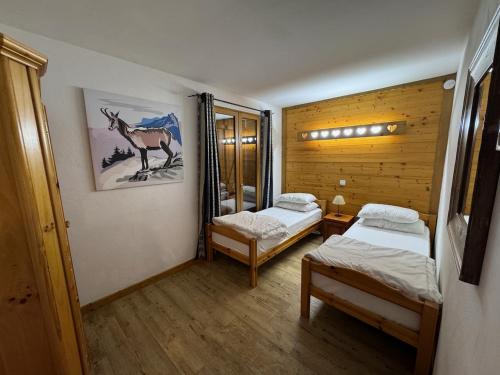 Postel nebo postele na pokoji v ubytování Apartment Petit Refuge