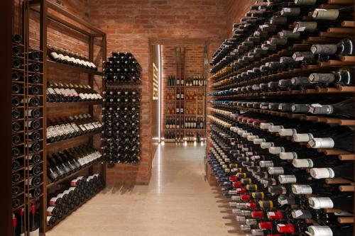 a room filled with lots of wine bottles at Ayan Zalaat in Ulaanbaatar