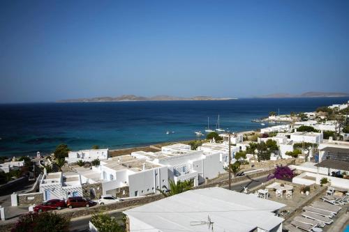 an aerial view of a town with the ocean at Mykonos Moussa in Agios Ioannis Mykonos