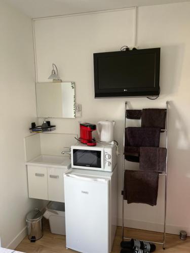 Kuchyň nebo kuchyňský kout v ubytování Chambre d'hôte chez l'habitant