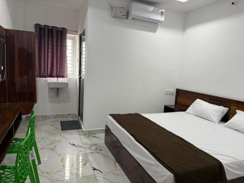 Katil atau katil-katil dalam bilik di Hotel Royal Park Inn