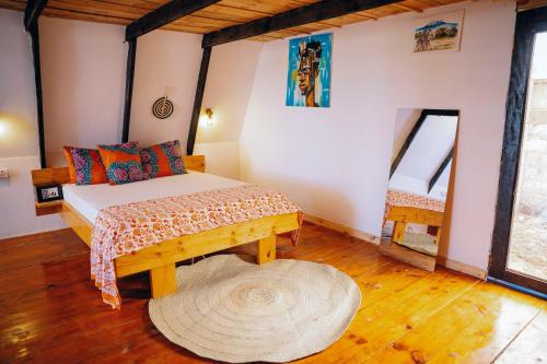 Ένα ή περισσότερα κρεβάτια σε δωμάτιο στο Cozy A-Frame Cabin Eco Stay by Nungwi Beach