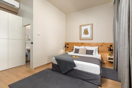 Ένα ή περισσότερα κρεβάτια σε δωμάτιο στο Rooms Alla Beccaccia