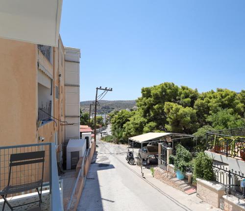 a view from the balcony of a house at Muse Studios & Apartments Aegina in Agia Marina Aegina