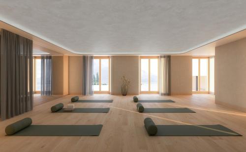 a yoga room with a lot of yoga mats at Suvretta House in St. Moritz