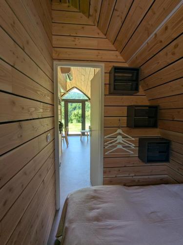 Llit o llits en una habitació de La cabane de romane