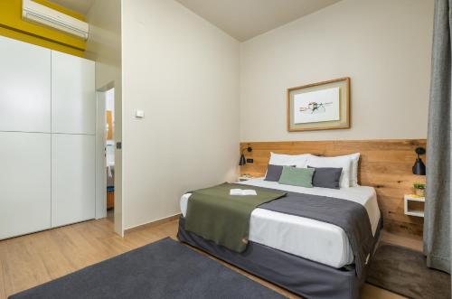 Ένα ή περισσότερα κρεβάτια σε δωμάτιο στο Rooms Alla Beccaccia