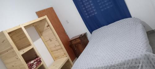 Ένα ή περισσότερα κρεβάτια σε δωμάτιο στο Depto Dm II centro