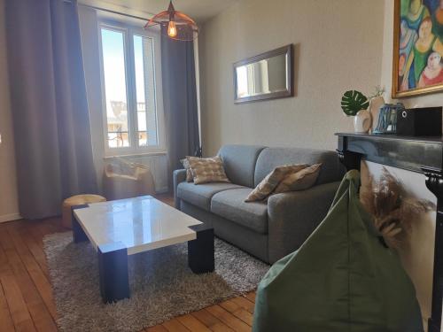 Posezení v ubytování Résidence Leclerc - Appartements d'hôtes - Secteur thermal