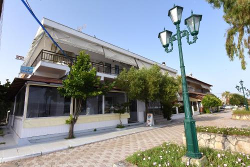 a street light in front of a building at Seaside Studios in Paralia Dionysiou