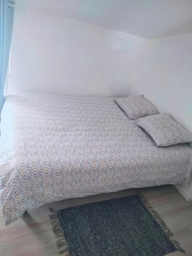 Ένα ή περισσότερα κρεβάτια σε δωμάτιο στο Duplex Hyper centre-ville 10