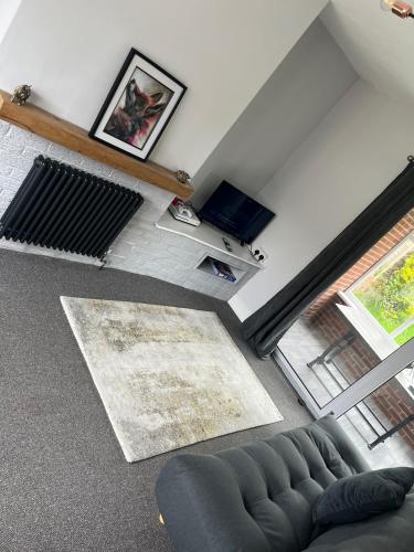 an overhead view of a living room with a couch at House - Sleeps 4-6 - Parking - Pet friendly in Ilkeston
